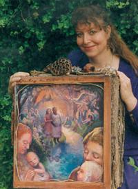 photo of Sheryl Cozad and a painting
